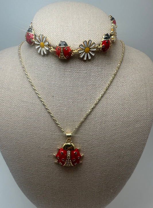 Add a playful touch to your style with this charming ladybug and daisy jewelry set!