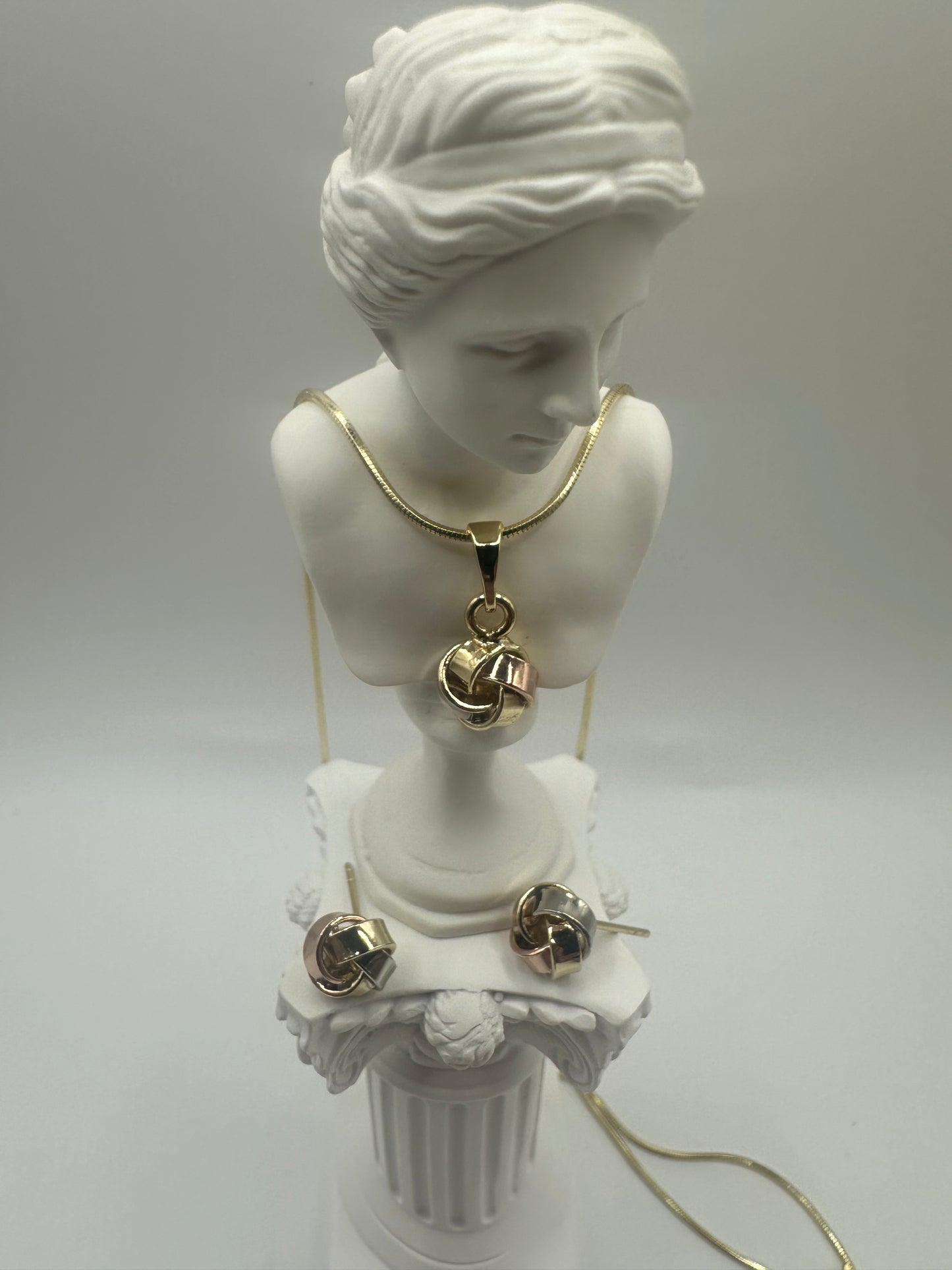 Elevate your elegance with this stunning gold jewelry set.